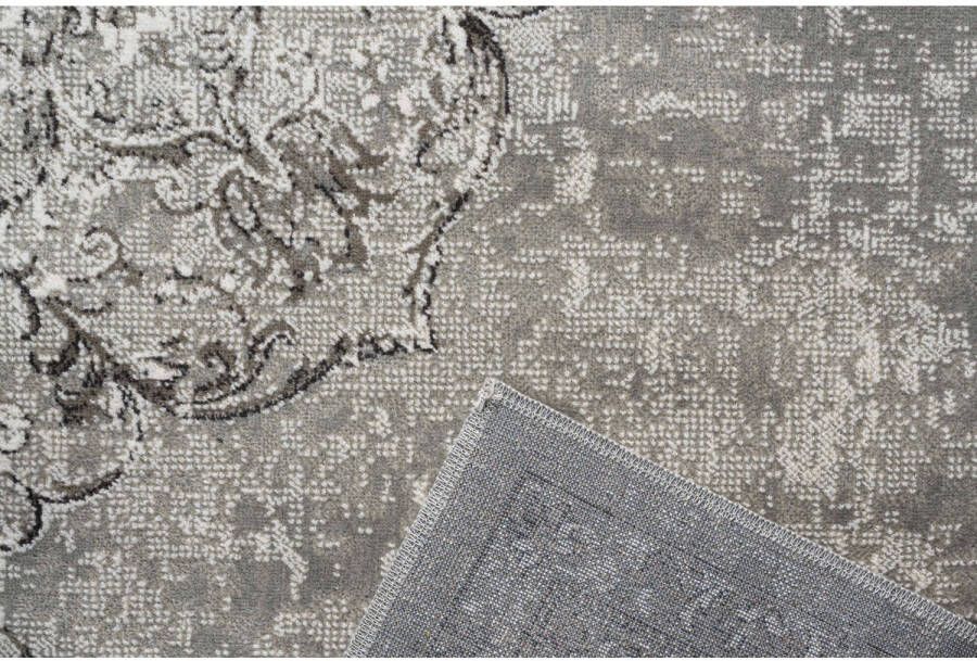 Interieur05 Vintage vloerkleed Ornament beige met franjes