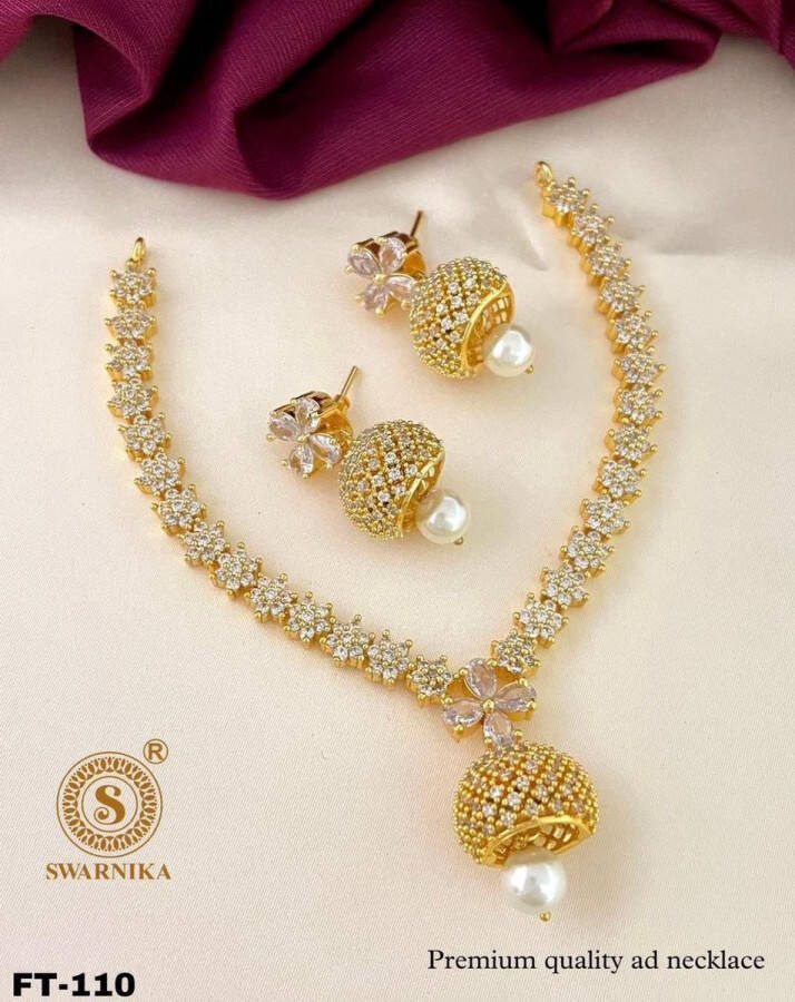 AD NECKLACE WITH EARRING STONES ARE AD STONE PARTY WEAR GIFT ITEM ORNAMENT SIERDEN GOLD FINISH