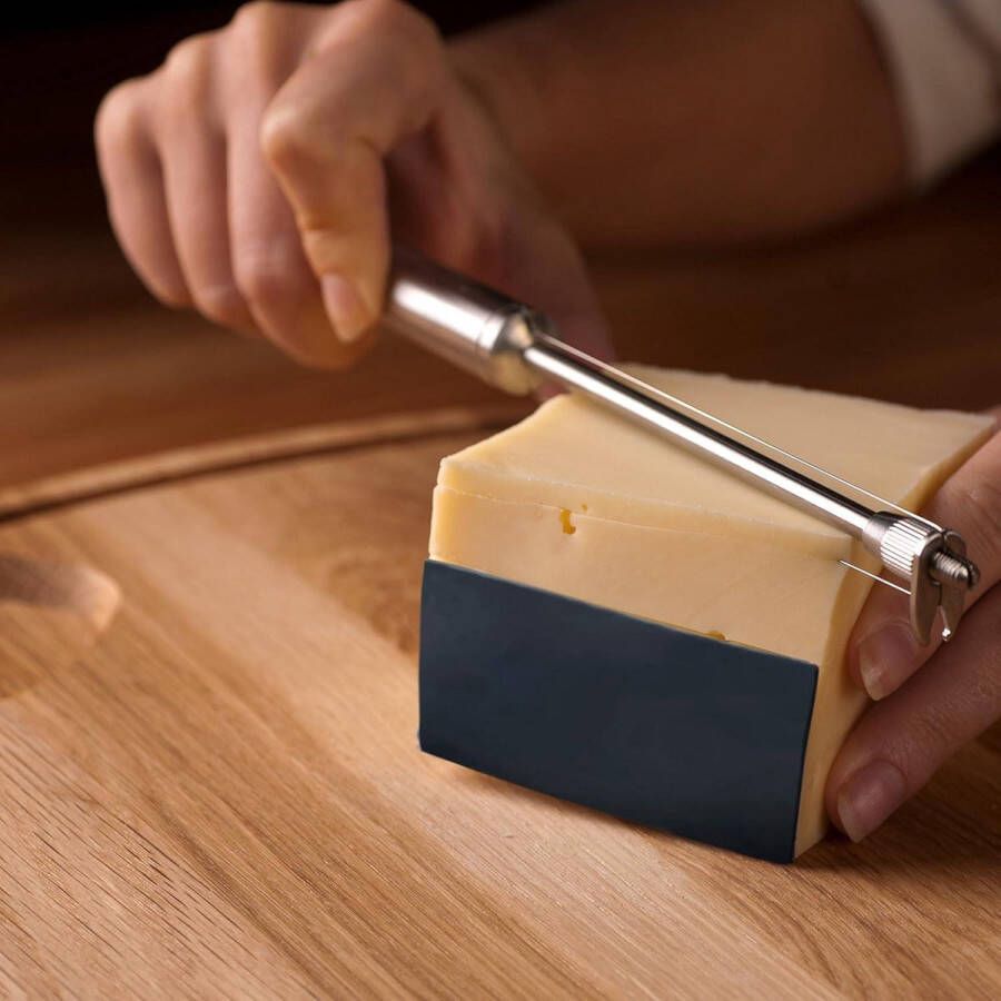 Kaasschaaf jonge kaas Originele kaasschaaf roestvrij staal blauw handvat Osti 122. Kaasschaaf jonge kaas
