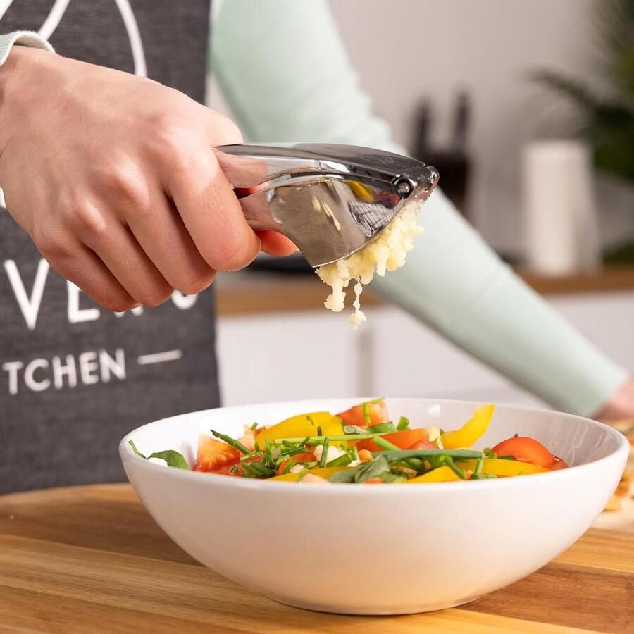 Premium Knoflookpers Gebruiksvriendelijk en makkelijk te reinigen Ideaal voor knoflook en gember Duurzaam en levenslang mee RVS Comfortabel handvat