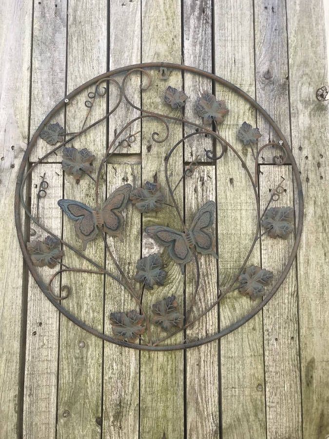 Wandornament met bladeren en vlinders metaal