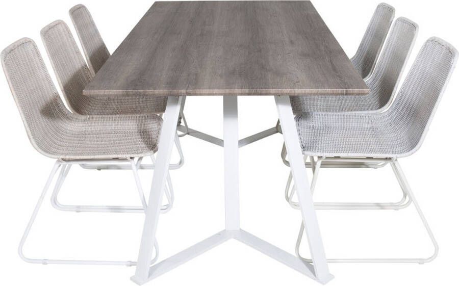 Hioshop MarinaGRWH eethoek eetkamertafel grijs en 6 Cirebon eetkamerstal rotan whitewash.