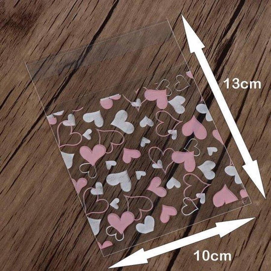 Jumada 's 100 Transparante Uitdeelzakjes met Hartjes Plastic Traktatiezakjes Roze Doorzichtig