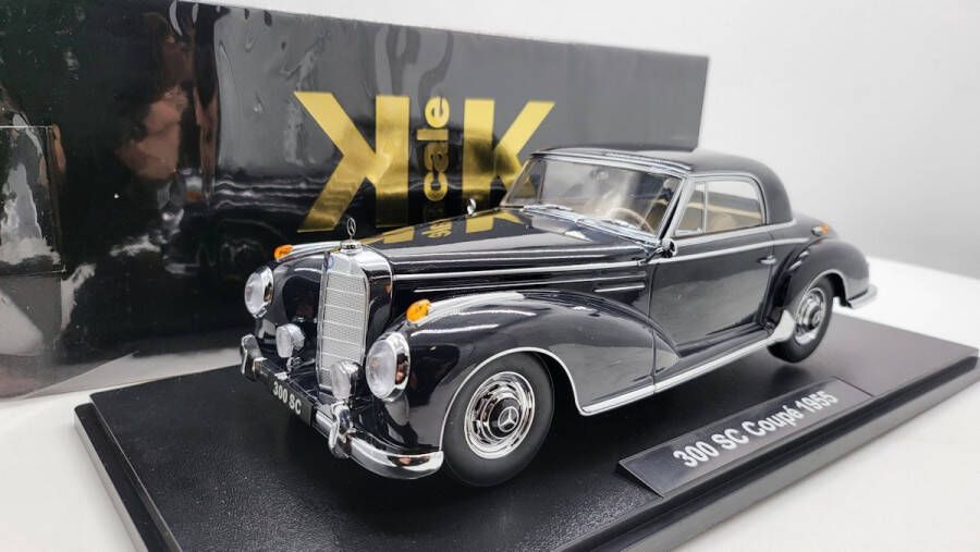 KK Models Het 1:18 Diecast-model van de Mercedes-Benz 300 SE W188 Coupé uit 1955 in donkerblauw. De fabrikant van het schaalmodel is . Dit model is alleen online verkrijgbaar
