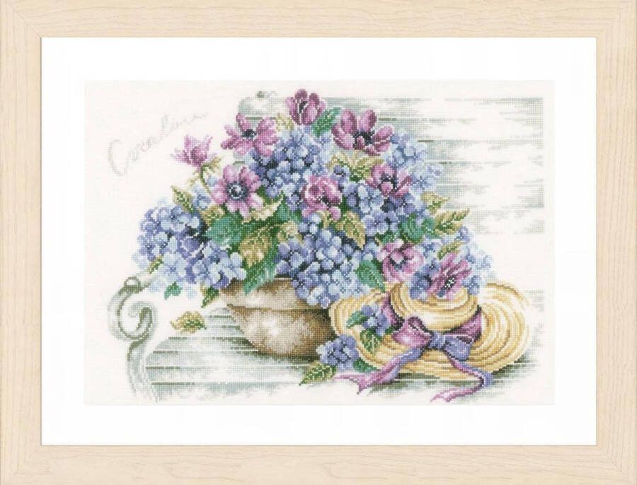 Lanarte Vervaco Borduurpakket hortensias op een bank