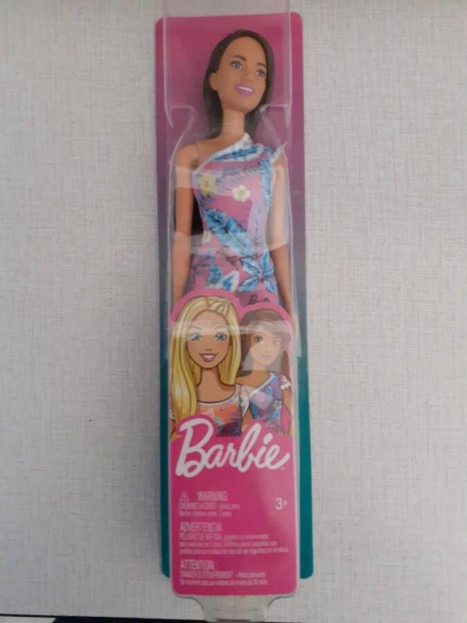 Mattel Barbie Mattel Barbie met bloemen jurkje.