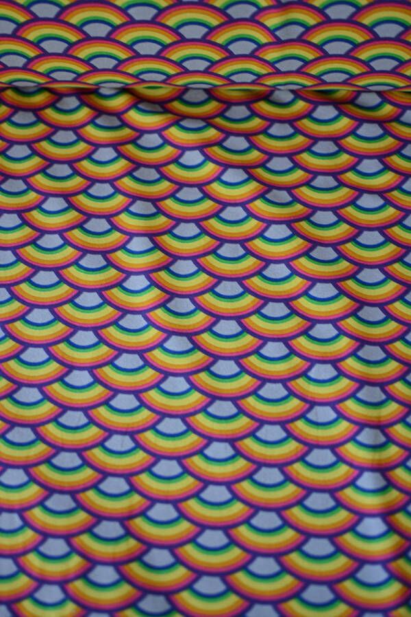Stoffenboetiek Tricot met regenboogjes 1 meter modestoffen voor naaien stoffen