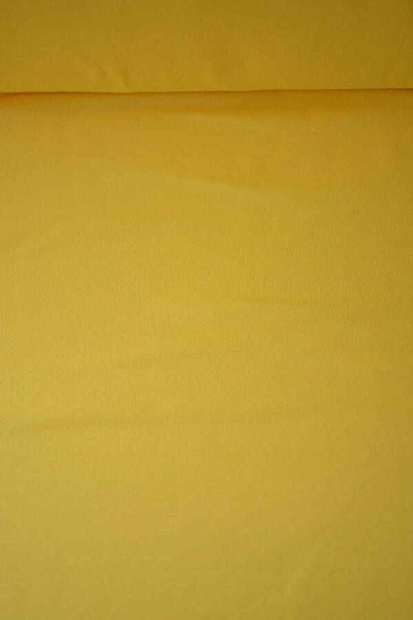 Stoffenboetiek Tricot uni kanarie geel 1 meter modestoffen voor naaien stoffen