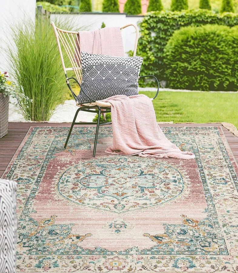 The carpet Palma Vloerkleed voor binnen en buiten plat weefsel robuust modern design vintage look used look supervlak uv- en weerbestendig Oosters patroon roze 140 x 200 cm
