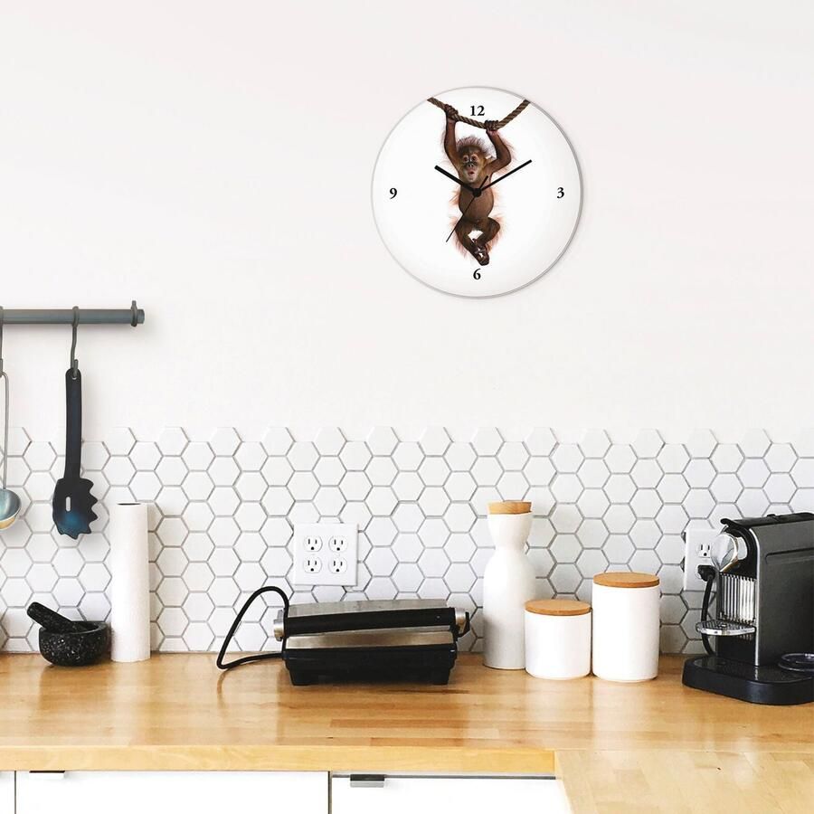 Artland Wandklok Baby Sumatra orang oetan hangt aan het touw