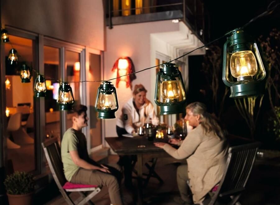 Konst Smide Konstsmide 4128 Snoerverlichting 8 lamps flakker LED stormlantaarns groen 700cm 24V voor buiten warmwit